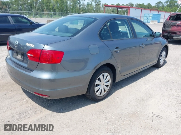 2014 Volkswagen Jetta S with VIN 3VW2K7AJ2EM328671, listed as a IAAI auction lot 42603027 with 156,137 mi miles and . Bid and sale history available at DreamBid. Image 4.
