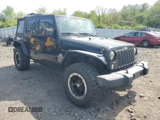 2015 Jeep Wrangler Unlimited Freedom с VIN 1C4BJWDG1FL609850, выставлен на аукционе Copart как лот 55169065 с пробегом 97 415 миль миль и Чистый • Clean title. История ставок и продаж доступна на DreamBid. Изображение 4.
