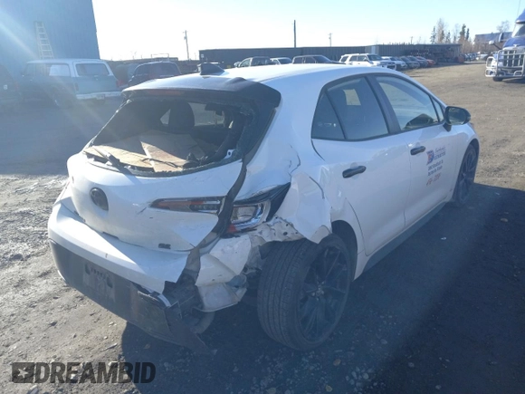 2021 Toyota Corolla Hatchback SE with VIN JTND4MBE7M3141993, listed as a Copart auction lot 73617514 with 20,029 mi miles and Salvage Title. Bid and sale history available at carsss.com. Image 3.