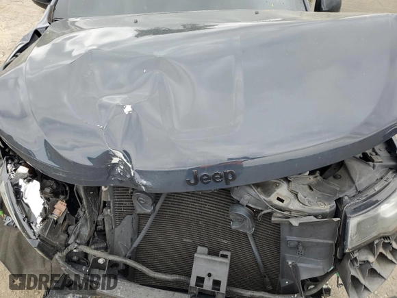 2018 Jeep Grand Cherokee Altitude z VIN 1C4RJEAG7JC392004, wystawiony jako Copart lot #53387525 z przebiegiem 103 406 mil mil oraz Szkoda całkowita • Salvage title. Historia ofert i sprzedaży dostępna na DreamBid. Obrazek 14.