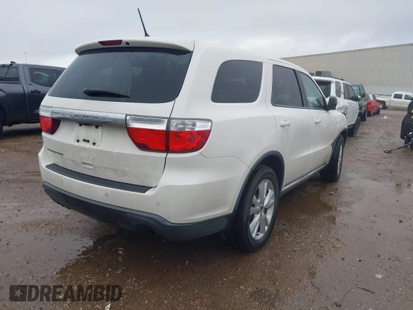 2012 Dodge Durango SXT with VIN 1C4RDHAG5CC308449, listed as a IAAI auction lot 41522856 with 111,284 mi miles and . Bid and sale history available at DreamBid. Image 4.