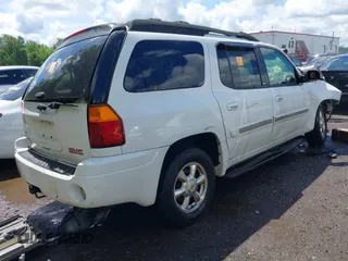 2003 GMC Envoy SLT z VIN 1GKES16S136235222, wystawiony jako IAAI lot #42245115 z przebiegiem Nie podano mil oraz . Historia ofert i sprzedaży dostępna na DreamBid. Obrazek 4.