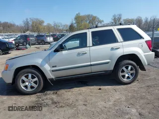 2008 Jeep Grand Cherokee Laredo with VIN 1J8GR48K28C169859, listed as a IAAI auction lot 41965149 with 166,069 mi miles. Bid and sale history available at carsss.com. Image 14.