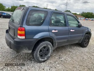 2005 Ford Escape XLS Value with VIN 1FMYU92Z95DA22100, listed as a Copart auction lot 57874705 with 192,057 mi miles and Salvage title. Bid and sale history available at DreamBid. Image 3.