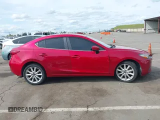 2017 Mazda 3 Touring with VIN 3MZBN1V79HM129043, listed as a IAAI auction lot 41970009 with 142,654 mi miles and . Bid and sale history available at DreamBid. Image 13.