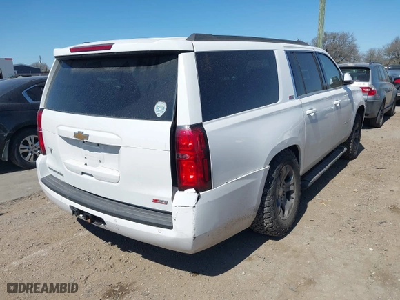 2019 Chevrolet Suburban LT with VIN 1GNSKHKC2KR297254, listed as a IAAI auction lot 41765492 with 63,058 mi miles. Bid and sale history available at carsss.com. Image 4.