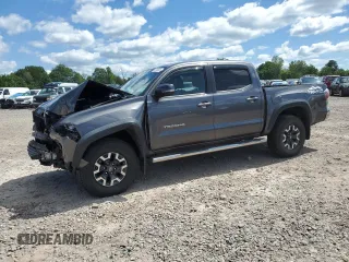 2021 Toyota Tacoma SR with VIN 3TYCZ5AN1MT021084, listed as a Copart auction lot 65163695 with 49,943 mi miles and Salvage title. Bid and sale history available at DreamBid. Image 1.