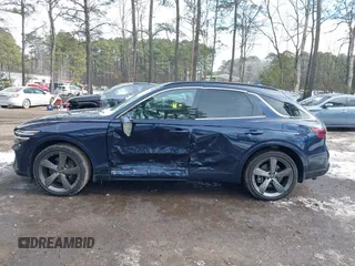 2022 Genesis GV70 Sport z VIN KMUMCDTC3NU074029, wystawiony jako IAAI lot #41400987 z przebiegiem 29 494 mil mil oraz . Historia ofert i sprzedaży dostępna na DreamBid. Obrazek 14.