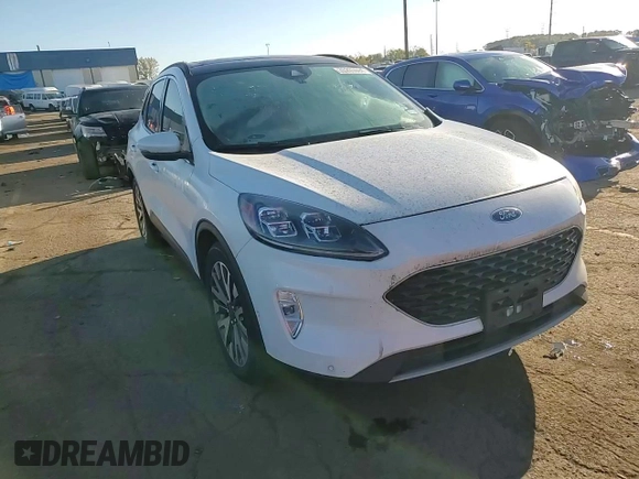 2020 Ford Escape Titanium Hybrid with VIN 1FMCU0DZ5LUA54462, listed as a Copart auction lot 76230694 with 32,698 mi miles and Salvage title. Bid and sale history available at DreamBid. Image 11.