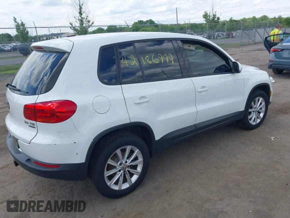 2014 Volkswagen Tiguan S with VIN WVGBV3AX0EW589381, listed as a IAAI auction lot 42186999 with 144,137 mi miles and . Bid and sale history available at DreamBid. Image 4.