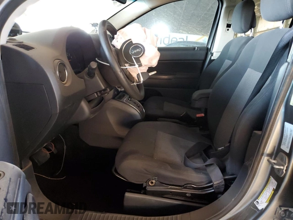 2011 Jeep Compass with VIN 1J4NT1FB3BD289800, listed as a Copart auction lot 42987715 with 152,154 mi miles and Salvage Title. Bid and sale history available at carsss.com. Image 7.