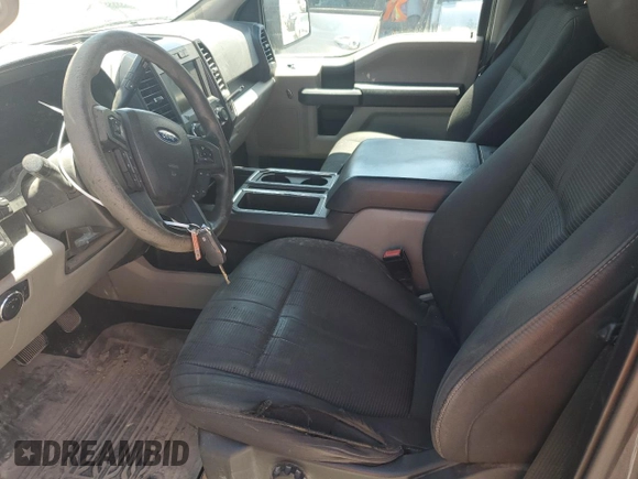 2018 Ford F-150 XL with VIN 1FTEW1EPXJKE71093, listed as a Copart auction lot 63812265 with 122,361 mi miles and Salvage title. Bid and sale history available at DreamBid. Image 7.