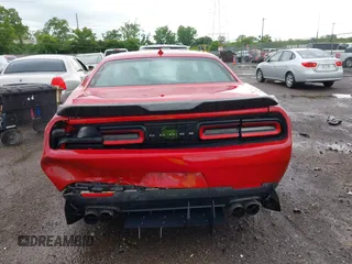 2016 Dodge Challenger R/T Plus z VIN 2C3CDZBT7GH300254, wystawiony jako IAAI lot #42289267 z przebiegiem 103 491 mil mil oraz . Historia ofert i sprzedaży dostępna na DreamBid. Obrazek 16.