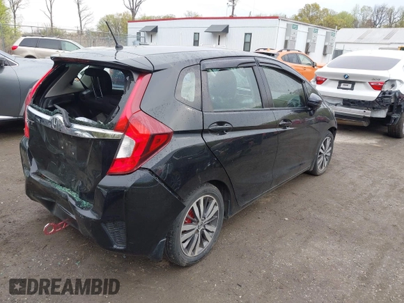 2015 Honda Fit EX-L with VIN 3HGGK5H88FM726406, listed as a IAAI auction lot 42033501 with 124,216 mi miles. Bid and sale history available at carsss.com. Image 4.