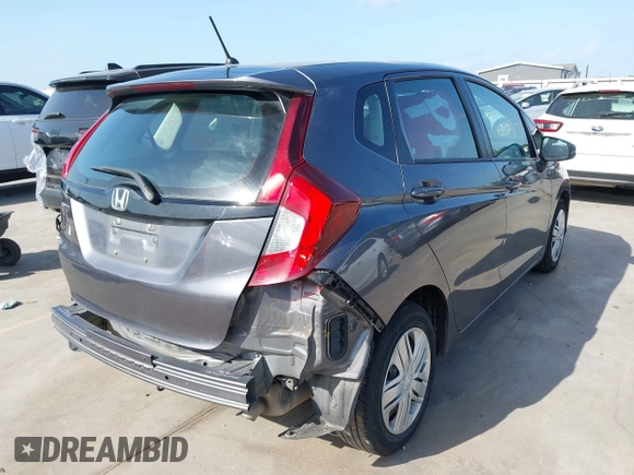 2020 Honda Fit LX with VIN 3HGGK5H46LM725764, listed as a IAAI auction lot 42499144 with 79,758 mi miles and . Bid and sale history available at DreamBid. Image 4.
