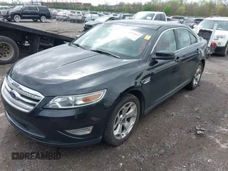 2011 Ford Taurus SHO with VIN 1FAHP2KT9BG153512, listed as a IAAI auction lot 41952063 with 230,922 mi miles and . Bid and sale history available at DreamBid. Image 2.