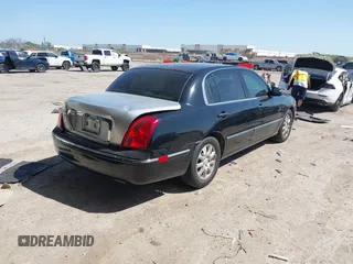 2008 Kia Amanti with VIN KNALD125385145061, listed as a IAAI auction lot 42006853 with 162,523 mi miles. Bid and sale history available at carsss.com. Image 4.