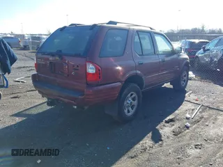 2002 Isuzu Rodeo S with VIN 4S2CK58W824301788, listed as a IAAI auction lot 41216681 with 171,615 mi miles and . Bid and sale history available at DreamBid. Image 4.