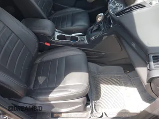 2014 Ford Escape Titanium with VIN 1FMCU0JX9EUE35382, listed as a IAAI auction lot 42085453 with 162,701 mi miles. Bid and sale history available at carsss.com. Image 5.
