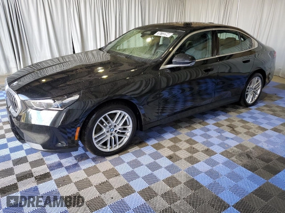 2024 BMW 5 Series 530i xDrive with VIN WBA53FJ01RCS03809, listed as a Copart auction lot 76772264 with 8,403 mi miles and Clean Title. Bid and sale history available at carsss.com. Image 1.
