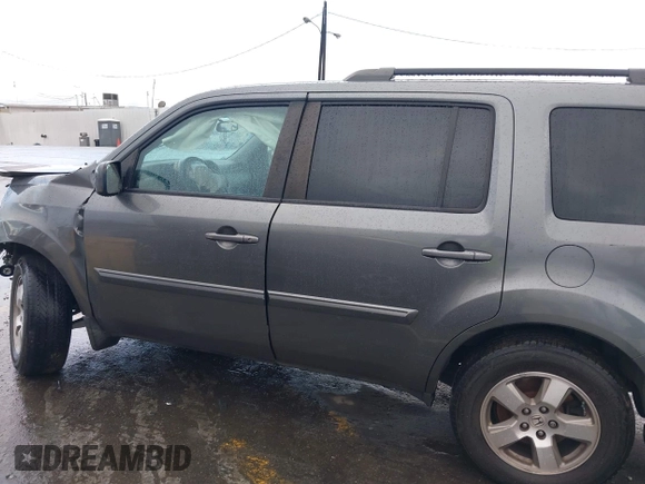 2011 Honda Pilot EX with VIN 5FNYF3H49BB026174, listed as a IAAI auction lot 41795460 with 201,488 mi miles and . Bid and sale history available at carsss.com. Image 14.