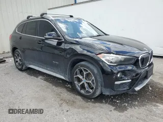 2016 BMW X1 xDrive28i z VIN WBXHT3C34G5E54952, wystawiony jako Copart lot #60713485 z przebiegiem 69 395 mil mil oraz Szkoda całkowita • Salvage title. Historia ofert i sprzedaży dostępna na DreamBid. Obrazek 4.