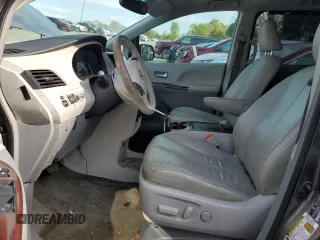 2013 Toyota Sienna XLE AAS with VIN 5TDYK3DC2DS372879, listed as a Copart auction lot 52174275 with 213,923 mi miles and Clean Title. Bid and sale history available at carsss.com. Image 7.