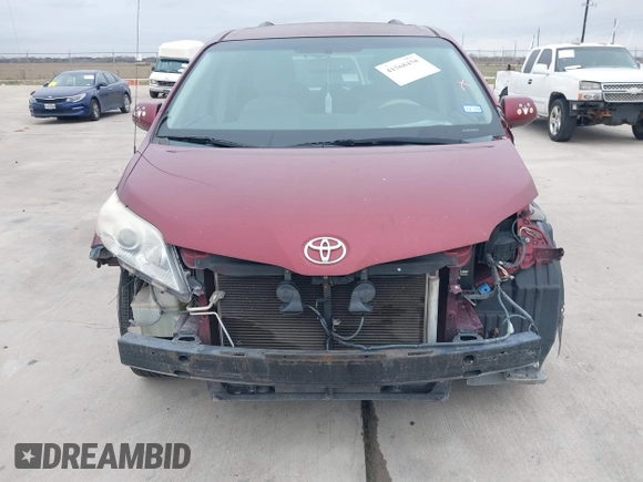 2014 Toyota Sienna LE AAS with VIN 5TDKK3DC6ES487962, listed as a IAAI auction lot 41568458 with 164,043 mi miles. Bid and sale history available at carsss.com. Image 6.