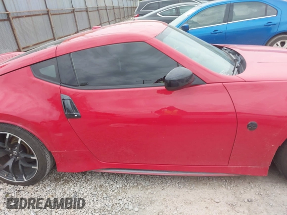 2016 Nissan 370Z Sport z VIN JN1AZ4EH7GM931035, wystawiony jako IAAI lot #42311165 z przebiegiem 83 947 mil mil oraz . Historia ofert i sprzedaży dostępna na DreamBid. Obrazek 13.