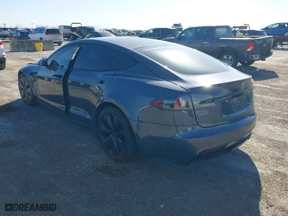 2022 Tesla Model S with VIN 5YJSA1E57NF467229, listed as a IAAI auction lot 41765897 with 1 mi miles. Bid and sale history available at carsss.com. Image 3.