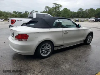 2011 BMW 1 Series 128i with VIN WBAUN1C5XBVH82605, listed as a Copart auction lot 73457334 with 94,969 mi miles and Salvage Title. Bid and sale history available at carsss.com. Image 3.
