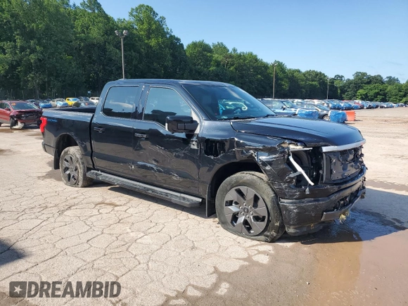 2023 Ford F-150 Lightning Pro z VIN 1FTVW1EV0PWG06971, wystawiony jako Copart lot #61850635 z przebiegiem 32 388 mil mil oraz Szkoda całkowita • Salvage title. Historia ofert i sprzedaży dostępna na DreamBid. Obrazek 4.