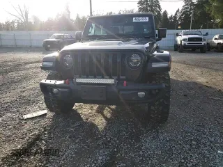 2021 Jeep Gladiator Rubicon with VIN 1C6JJTBG5ML500423, listed as a Copart auction lot 46954765 with 82,483 mi miles and Salvage title. Bid and sale history available at DreamBid. Image 11.