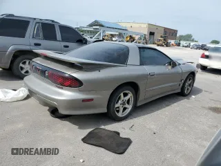 2001 Pontiac Firebird Formula z VIN 2G2FV22G912123611, wystawiony jako Copart lot #56820064 z przebiegiem 55 319 mil mil oraz Szkody całkowita. Historia ofert i sprzedaży dostępna na DreamBid. Obrazek 3.