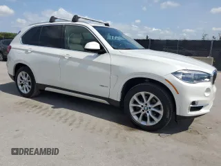 2014 BMW X5 xDrive35i z VIN 5UXKR0C51E0H17912, wystawiony jako Copart lot #61819105 z przebiegiem 218 784 mil mil oraz Czysty tytuł • Clean title. Historia ofert i sprzedaży dostępna na DreamBid. Obrazek 4.