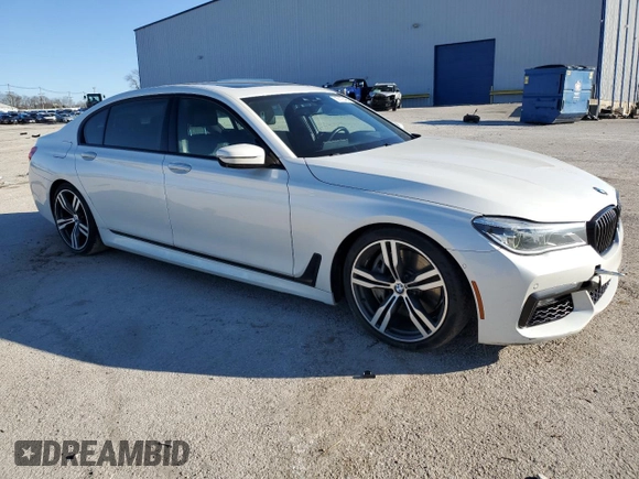 2017 BMW 7 Series 750i with VIN WBA7F0C39HGM22030, listed as a Copart auction lot 87127484 with 110,634 mi miles and Salvage title. Bid and sale history available at DreamBid. Image 4.