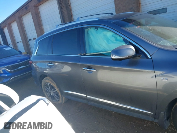 2016 Infiniti QX60 with VIN 5N1AL0MM6GC522175, listed as a IAAI auction lot 41427647 with 74,546 mi miles and . Bid and sale history available at DreamBid. Image 13.