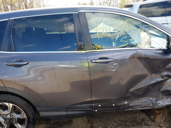 2017 Honda CR-V EX with VIN 2HKRW2H5XHH678674, listed as a IAAI auction lot 42039505 with 124,891 mi miles. Bid and sale history available at carsss.com. Image 14.