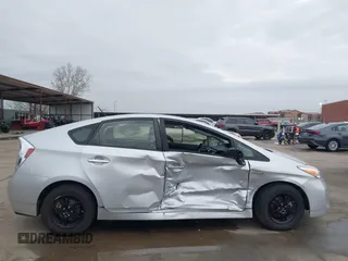 2015 Toyota Prius Four z VIN JTDKN3DU7F1942591, wystawiony jako IAAI lot #41439295 z przebiegiem 86 406 mil mil oraz . Historia ofert i sprzedaży dostępna na DreamBid. Obrazek 6.