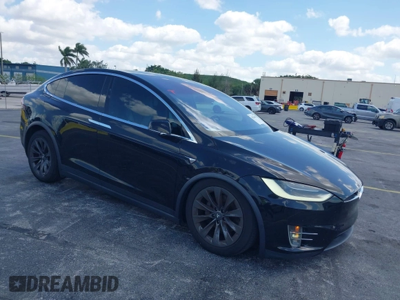 2017 Tesla Model X 90D with VIN 5YJXCBE21HF054898, listed as a IAAI auction lot 42076462 with 89,996 mi miles and . Bid and sale history available at DreamBid. Image 1.