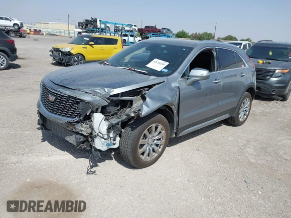 2023 Cadillac XT4 AWD Premium Luxury with VIN 1GYFZDR47PF163923, listed as a IAAI auction lot 42136236 with 52,012 mi miles and . Bid and sale history available at DreamBid. Image 2.