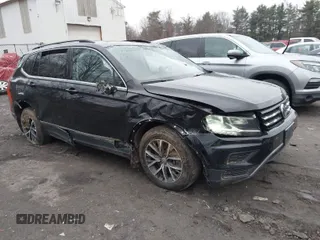 2020 Volkswagen Tiguan SE with VIN 3VV2B7AXXLM006852, listed as a IAAI auction lot 41847653 with 87,123 mi miles and . Bid and sale history available at DreamBid. Image 1.