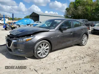 2017 Mazda 3 Touring with VIN 3MZBN1L77HM117864, listed as a Copart auction lot 51895385 with 63,076 mi miles and Salvage Title. Bid and sale history available at carsss.com. Image 1.
