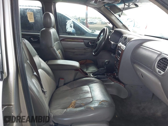 2004 GMC Envoy SLT with VIN 1GKDS13S942267554, listed as a IAAI auction lot 41754066 with 178,895 mi miles. Bid and sale history available at carsss.com. Image 5.
