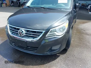 2012 Volkswagen Routan SE z VIN 2C4RVABG5CR127653, wystawiony jako IAAI lot #42090635 z przebiegiem 205 293 mil mil oraz . Historia ofert i sprzedaży dostępna na DreamBid. Obrazek 6.