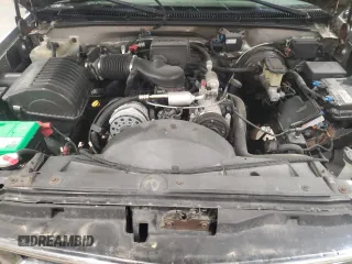 1999 Chevrolet Suburban z VIN 3GNFK16R4XG250550, wystawiony jako Copart lot #51941515 z przebiegiem 202 667 mil mil oraz Szkoda całkowita • Salvage title. Historia ofert i sprzedaży dostępna na DreamBid. Obrazek 12.