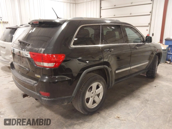 2012 Jeep Grand Cherokee Laredo with VIN 1C4RJFAG6CC266144, listed as a IAAI auction lot 41497163 with 233,755 mi miles. Bid and sale history available at carsss.com. Image 4.