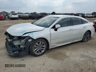 2021 Toyota Avalon Hybrid XLE z VIN 4T1JA1AB2MU005217, wystawiony jako Copart lot #69379874 z przebiegiem 103 377 mil mil oraz Szkoda całkowita • Salvage title. Historia ofert i sprzedaży dostępna na DreamBid. Obrazek 1.