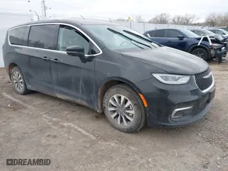 2023 Chrysler Pacifica Hybrid Touring L with VIN 2C4RC1L7XPR518209, listed as a IAAI auction lot 41038104 with 35,969 mi miles. Bid and sale history available at carsss.com. Image 1.
