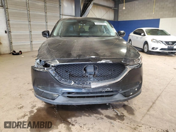 2020 Mazda CX-5 Touring with VIN JM3KFACM1L0768402, listed as a Copart auction lot 54680905 with 93,455 mi miles and Salvage Title. Bid and sale history available at DreamBid. Image 5.